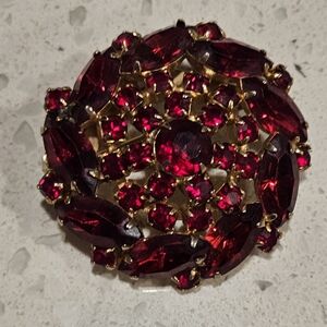 Vintage garnet colored brooch pin